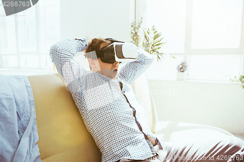 Image of The man with glasses of virtual reality. Future technology concept.