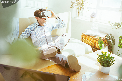 Image of The man with glasses of virtual reality. Future technology concept.