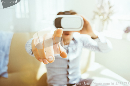 Image of The man with glasses of virtual reality. Future technology concept.