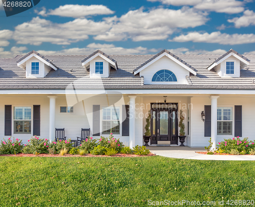 Image of Beautiful Custom Built Home Facade and Yard.