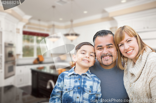 Image of Young Mixed Race Family Having in Beautiful Custom Kitchen