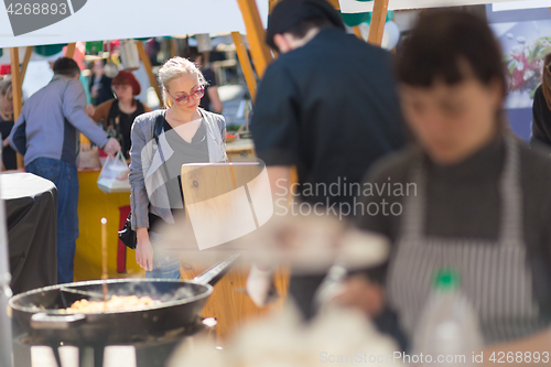 Image of People enjoing outdoor street food festival in Ljubljana, Slovenia.
