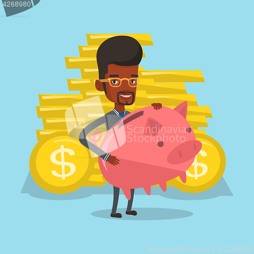 Image of Businessman holding a big piggy bank.