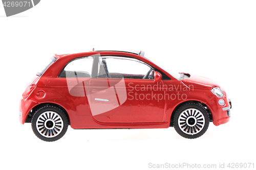 Image of red metal toy car 