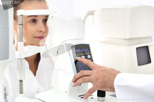 Image of The pressure in the eye, the patient with an ophthalmologist An eye exam, the patient in ophthalmology clinic