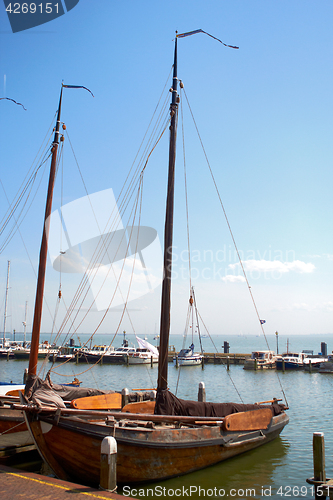 Image of Moody shots of boats tied alongside the moorings at Volendam, Holland