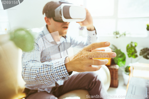 Image of The man with glasses of virtual reality. Future technology concept.