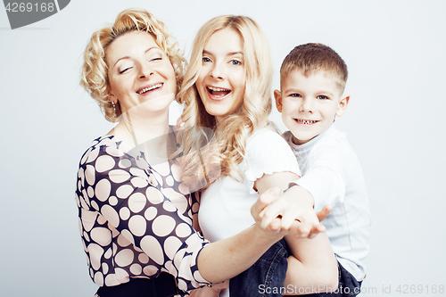 Image of happy smiling family together posing cheerful on white background, lifestyle people concept, mother with son and teenage daughter isolated