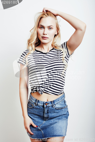 Image of young pretty stylish blond hipster girl posing emotional isolated on white background happy smiling cool smile, lifestyle people concept 