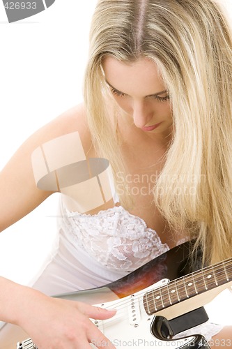 Image of guitar girl in white lingerie