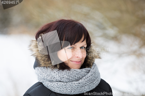 Image of woman without makeup in winter time