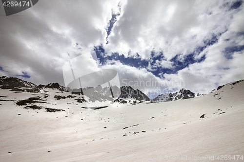 Image of Snow mountain and cloud sky in gray spring day