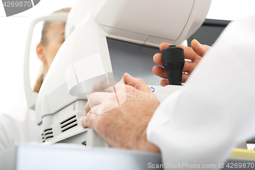 Image of Ophthalmologist, eye test computer.