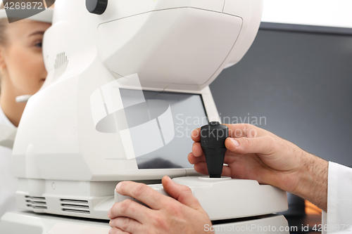 Image of Ophthalmologist, eye test computer.