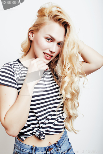 Image of young pretty stylish blond hipster girl posing emotional isolated on white background happy smiling cool smile, lifestyle people concept 