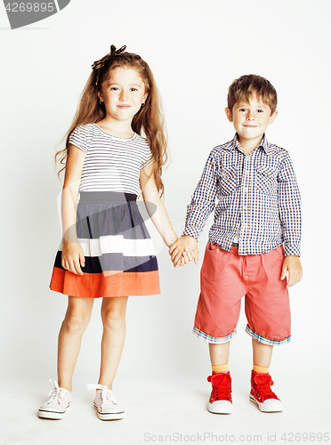 Image of little cute boy and girl hugging playing on white background, happy smiling family, lifestyle people concept