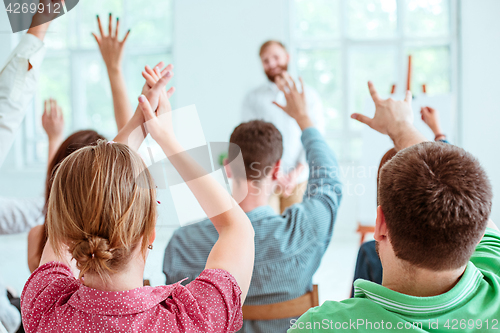 Image of Speaker at Business Meeting in the conference hall.