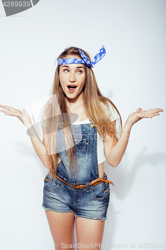 Image of young pretty stylish blond hipster girl posing emotional isolated on white background happy smiling cool smile, lifestyle people concept