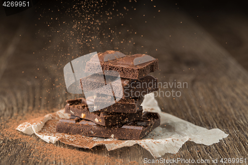 Image of Chocolate with nuts sprinkled cocoa