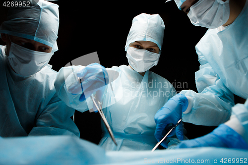 Image of Photo of doctors with instruments