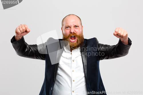 Image of Screaming man with hands up