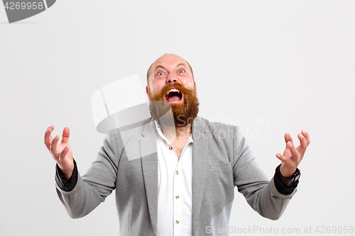 Image of Brutal screaming man looking up