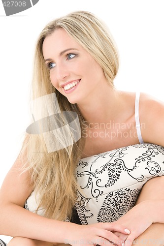 Image of happy blonde with pillow