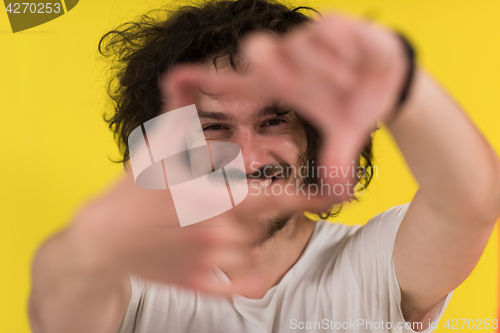 Image of young man with funny hair over color background