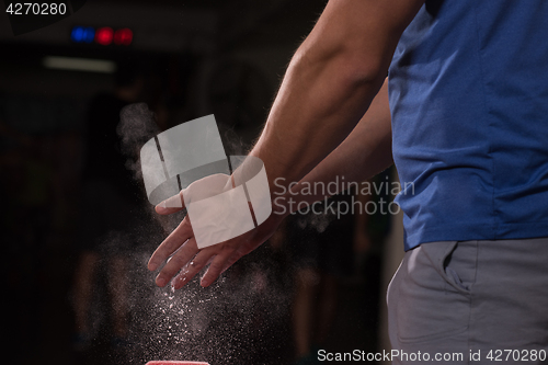 Image of Gym Chalk Magnesium Carbonate hands clapping man