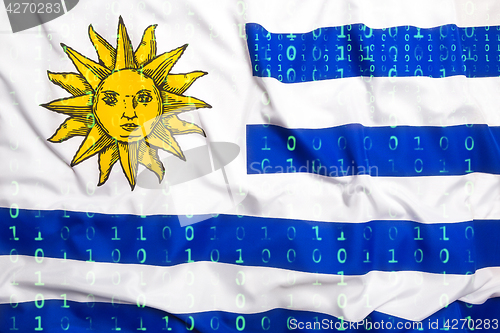 Image of Binary code with Uruguay flag, data protection concept