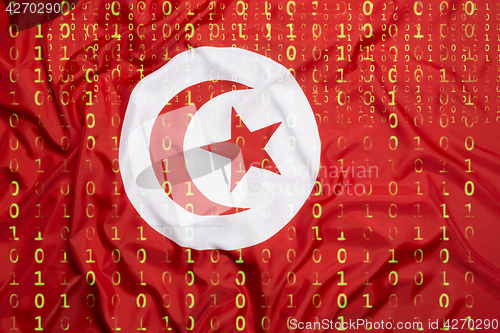 Image of Binary code with Tunisia flag, data protection concept
