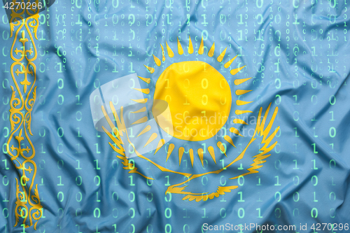 Image of Binary code with Kazakhstan flag, data protection concept