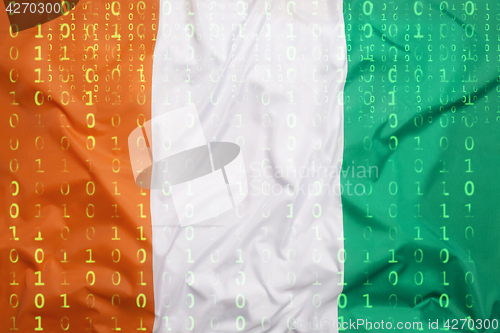 Image of Binary code with Ivory Coast flag, data protection concept