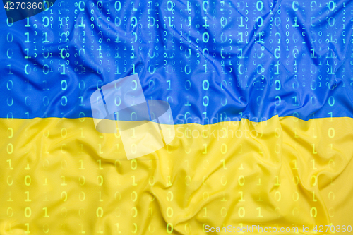 Image of Binary code with Ukraine flag, data protection concept