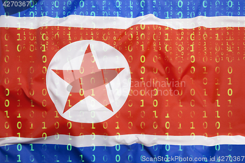 Image of Binary code with North Korea flag, data protection concept