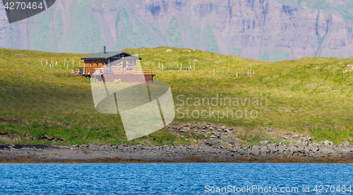 Image of Single house on an small island - Iceland