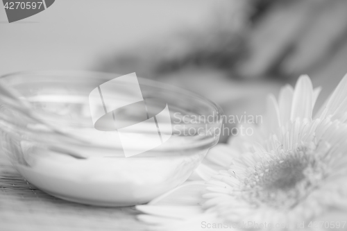 Image of female feet and hands at spa salon