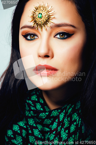 Image of beauty eastern real muslim woman with jewelry close up, bride wi