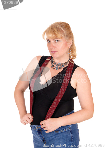 Image of Blond woman with suspender.