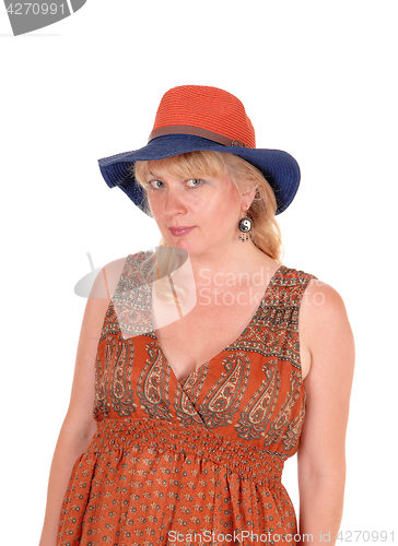 Image of Portrait of blond woman with hat.