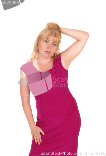 Image of Serious looking woman in dress.