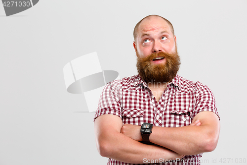 Image of Thoughtful man with ginger beard