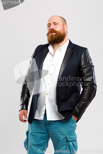 Image of Man with ginger beard in jeans