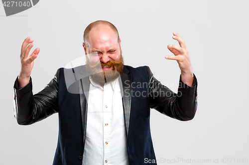 Image of Dissatisfied, screaming man with beard