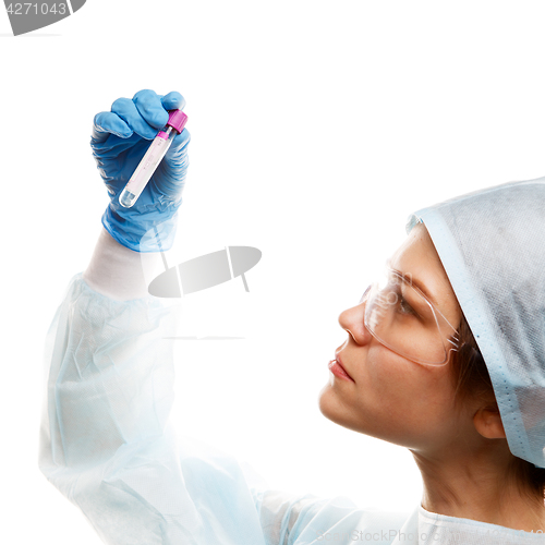 Image of Young woman with test tube