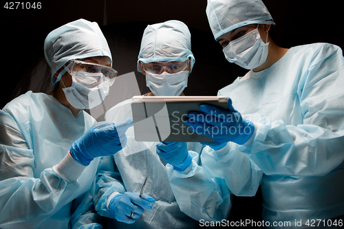 Image of Doctors with tablet in hands