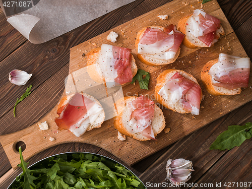 Image of Table with bread and bacon