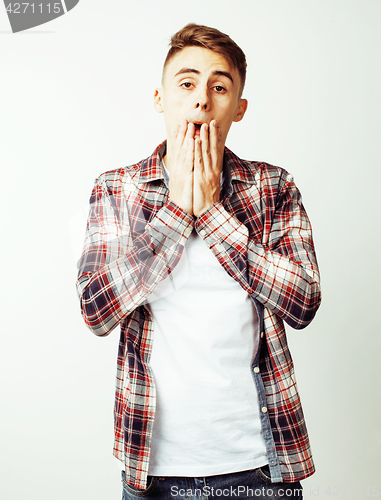 Image of young handsome teenage hipster guy posing emotional, happy smiling against white background isolated, lifestyle people concept