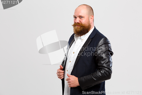 Image of smllng man with ginger beard