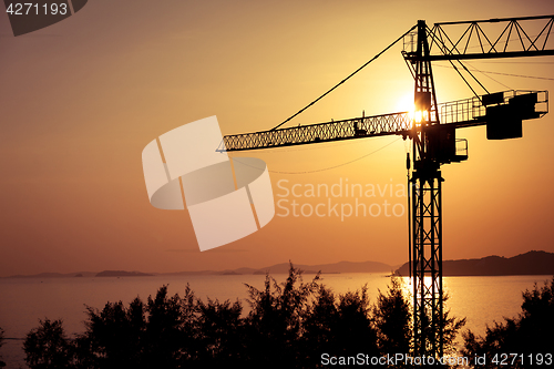 Image of Tower crane on a construction site 